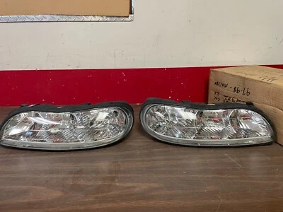 1997-2003 CHEVY MALIBU 1997-1999 OLDSMOBILE CUTLASS L&R HEADLIGHT ASSEMBLIES NOS - Image 1 of 4