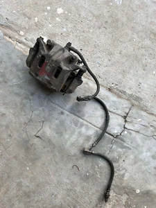 06-08 NISSAN 350Z LEFT DRIVER FRONT BRAKE CALIPER w/ BRACKET OEM - Picture 1 of 4