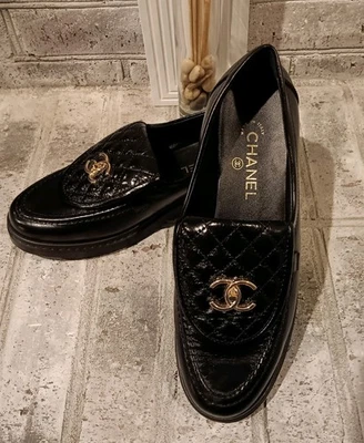 Chanel 22S G36646 BLK Quilted Turnlock CC Gold Logo Womens Loafer EU42/US10-10.5 - Image 1 of 4