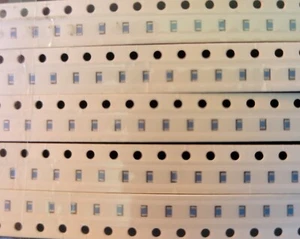 100pcs 143K ±1% 0.1W, 1/10W Chip Resistor 0603 Thick Film KOA RK73H1JT1433F - Picture 1 of 2