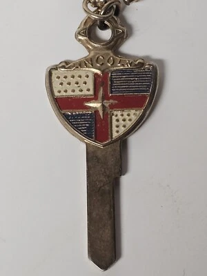 Llave en blanco escudo de armas vintage de coche Lincoln años 50 sin cortar Foto 1 de 3