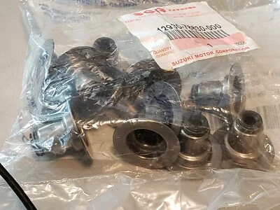 正品 GM 铃木发动机阀杆密封套装 12 件每袋  — 第 1/4 张图片