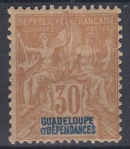 TIMBRE GUADELOUPE TYPE GROUPE 30c BRUN N° 35 NEUF * GOMME AVEC CHARNIERE - Picture 1 of 2