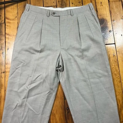 Pantalones de vestir Ermenegildo Zegna para hombre 36 (se adapta a 36x26,5) pantalones de lana pantalones plisados con puños Foto 1 de 4