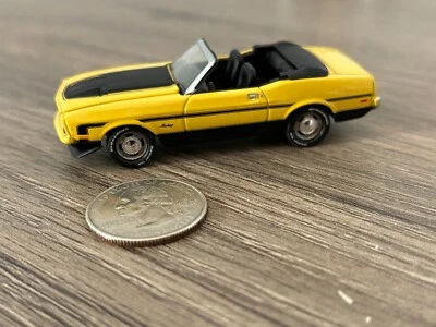 Johnny Lightning 1972 Yellow Ford Mustang Convertible - Rubber Tires  1:64 - Image 1 of 4