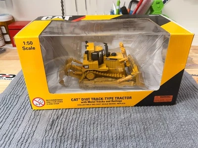 Topadora con desgarrador Caterpillar Cat D10T - Norscot escala 1:50 modelo #55158 nueva Foto 1 de 4