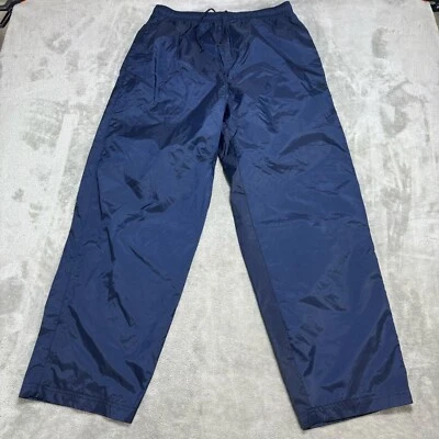 Pantalones deportivos de colección Wilson forrados azules con cremallera al tobillo grandes para hombre Foto 1 de 4