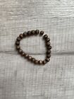 mens dark brown wooden beaded bracelet. gently used