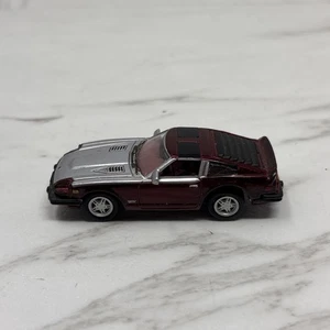 JOHNNY LIGHTNING  ‘81 Datsun 280ZX  Turbo Metal Burgundy - Picture 1 of 6