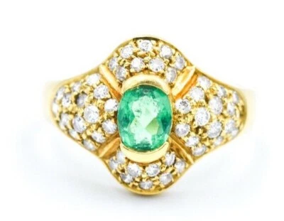 Anillo de oro de 18 quilates con diamantes esmeralda Foto 1 de 4