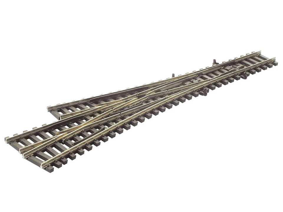 Peco SL-E399F - 3-Weg-Weiche asymetrisch mit leitenden Herzstücken Code 55 - NEU - Bild 1 von 1