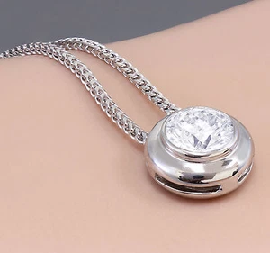 COLLANA SOLITARIO LUNETTA DIAMANTE ROTONDA ORO BIANCO 14K E CATENA NATURALE 0,75CT - Foto 1 di 5