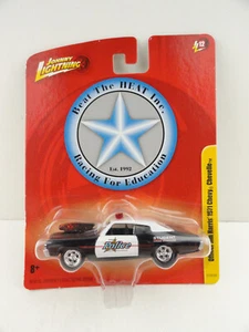 Johnny Lightning Forever 64 R12 Officer Jim Harris’ 1971 Chevy Chevelle (Black) - Picture 1 of 6