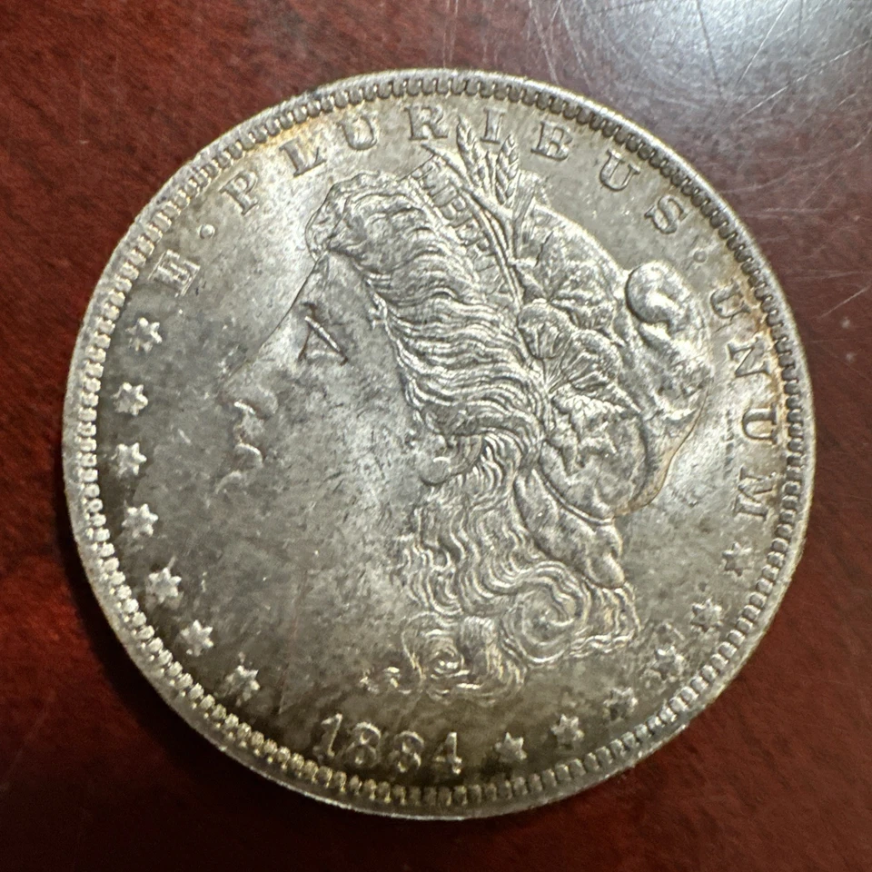 Dólar de plata Morgan 1884 en buen estado circulado. Nueva Orleans como nuevo Foto 1 de 4