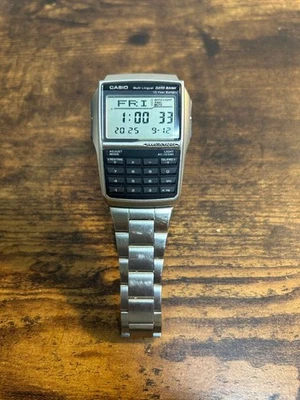 Orologio CASIO DATA BANK DBC32D-1A Argento Calcolatrice Testato Giappone Usato F/S - Immagine 1 di 4