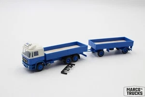 Herpa MAN F90 flatbed truck and trailer white/blue without superstructure 1:87 / - Picture 1 of 1