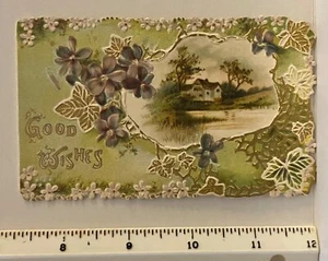 BUENOS DESEOS ~ TARJETA VICTORIANA DEL DÍA DE SAN VALENTÍN ~ TROQUELADA Y GRABADA EN RELIEVE con FLORES Y ESCENA - Imagen 1 de 3