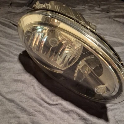 Headlight Assembly Right TYC For 2012-2019 Volkswagen Beetle - Image 1 of 3