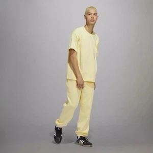 Felpa Adidas Pharrell Williams Human Race Joggers Medium quasi gialla nuova - Foto 1 di 15