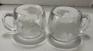 Juego de 2 tazas de vidrio transparente Nestlé Nescafe grabadas alrededor del mundo - Imagen 1 de 7