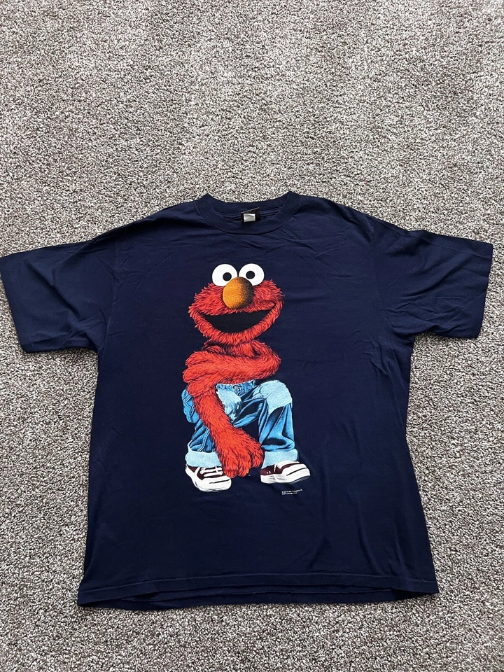 Camiseta Elmo Vintage Jim Henson Sesame Street Fabricada nos EUA Anos 90 - Imagem 1 de 4
