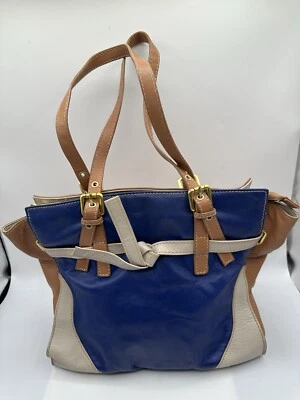 Bolso de mano Christopher Kon Atelier de cuero con cinturón en bloques de colores Foto 1 de 4