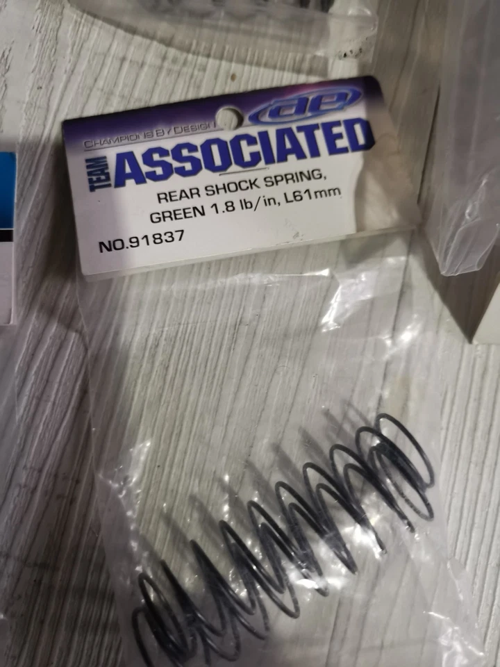 Team Associated 12mm Rear Shock Spring (2) (Green/1.80lbs) (61mm Long) 91837 - Photo 1/1