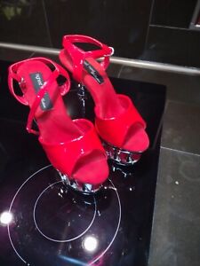 The Highest Heel Red With Chrome Heel (Size 7)