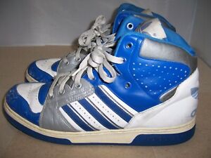ADIDAS BLUE and WHITE ATHLETIC MEN'S HIGH TOP SHOES, (FITS LIKE A MEN SZ 10.5)