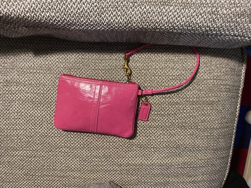 COACH Frittura da polso in pelle verniciata rosa