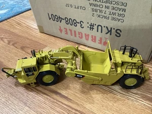 Rascador tractor rueda CAT 657G escala 1:50 coleccionable fundido a presión NORSCOT sin caja - Imagen 1 de 12
