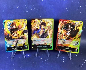 One Piece Three Brothers ST13 Foil Leaders Monkey D Luffy & Sabo & Portgas D Ace - Bild 1 von 17