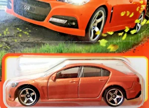 Matchbox 2016 HOLDEN VF COMMODORE SSV (aka "Chevy SS") orange; diecast 1/64 NEW - Picture 1 of 5
