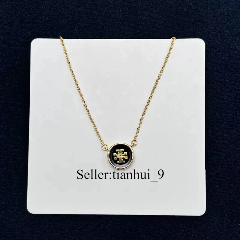 全新! Tory 黑色圆形项链带珠宝袋 尺寸长度:46 厘米 — 第 1/3 张图片