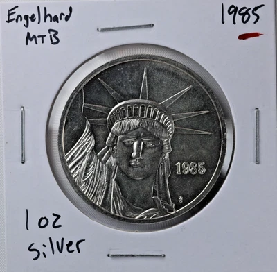Engelhard 1985 MTB Centenario Estatua de la Libertad Unidad de Comercio 1 oz Plata Fina 0,999 Foto 1 de 4