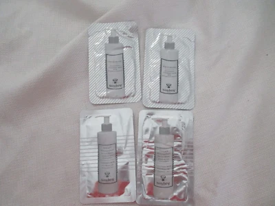 MUESTRA lote de prueba de viaje conjunto lote 4 SISLEY Lyslait leche limpiadora lirio y botánica Foto 1 de 2