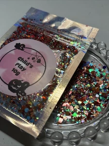NAIL ART GLITTER NEW!! HALLOWEEN CHILDS PLAY  10G HOLOGRAPHIC BAG - Picture 1 of 1