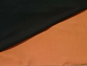 THIN VISCOSE FABRIC-BLACK  AND ORANGE COLOURS SOLD BY THE METRE - Picture 1 of 7