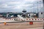 Photo 6x4 Manchester Airport Thorns Green Terminal 1, from a plane taxiin c2010