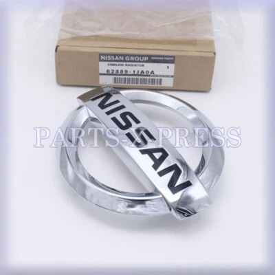 62889-1JA0A OEM GENUINE NISSAN FRONT RADIATOR GRILLE EMBLEM LOGO QUEST 2011-2017 - Image 1 of 4