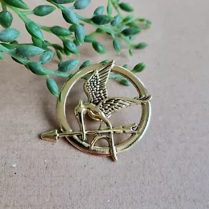 Hunger Games Mockingjay Pin Abzeichen - Gold Metall Pin Geschenk - Bild 1 von 1