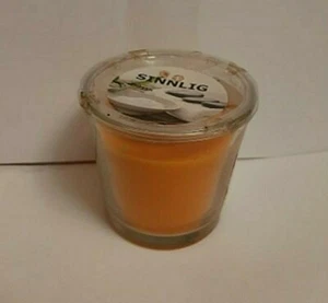 NUEVA VELA DE VIDRIO PERFUMADO IKEA SINNLIG en Naranja, Quema 25 Hrs - Imagen 1 de 2