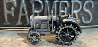 Spec Cast Pewter ZJD-11 McCormick Deering Tractor. - Image 1 of 4