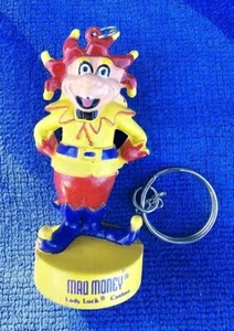 Vintage Mad Money Lady Luck Casino Figur Narr Werbung Anhänger Schlüsselanhänger B - Bild 1 von 5
