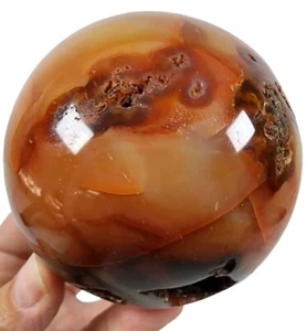 Carnelian Agate Polished Sphere Madagascar 1lb 6.1oz. - Picture 1 of 3