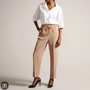 Neu ohne Etikett Ted Baker camelfarbene Laurai schmal geschnittene Hose Gr. 2 (US-Größe 4) #C2 - Bild 1 von 6