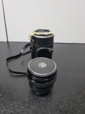 Sigma SQ 24mm f/2.8 Filtermatic Multi-Coated Konica Mount Lens - Image 1 of 4