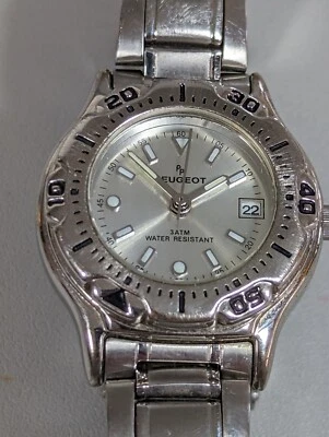 Reloj pulsera Peugeot esfera tono plata bisel giratorio acero inoxidable eslabón correa Foto 1 de 4