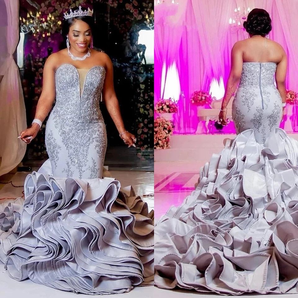 Vestidos de novia africanos grises sirena talla grande sin mangas con volantes Foto 1 de 4