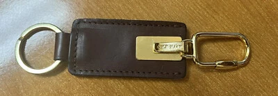 Cole Haan Dos Caras Tono Dorado Mosquetón Clip Llavero Cuero Llavero Foto 1 de 4